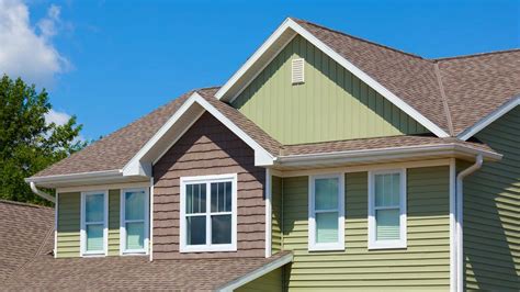 metal siding on house over stucco|cost of stucco vs siding.